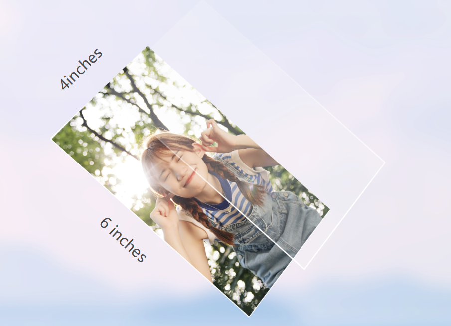 Stack of 4x6 printed photos in hands